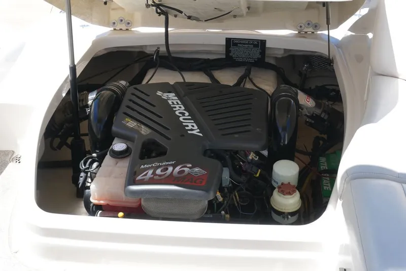 Slide: The Image of The engine compartment of a 2008 Chaparral 264 Sunesta with a Mercury 496 MAG engine is visible. - 30