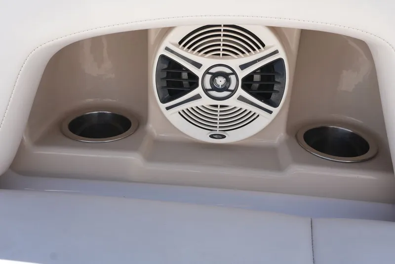 Slide: The Image of Speaker and cup holders on a 2008 Chaparral 264 Sunesta boat. - 16