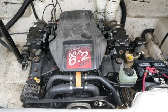 Slide: The Image of Engine of 2002 Rinker 276 Captiva Cuddy boat, featuring MerCruiser MX 6.2 MPI. - 17