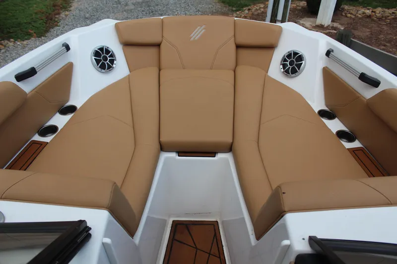 Slide: The Image of Luxurious interior of 2021 ATX Surf Boats 24 Type-S with tan seating and speakers. - 17