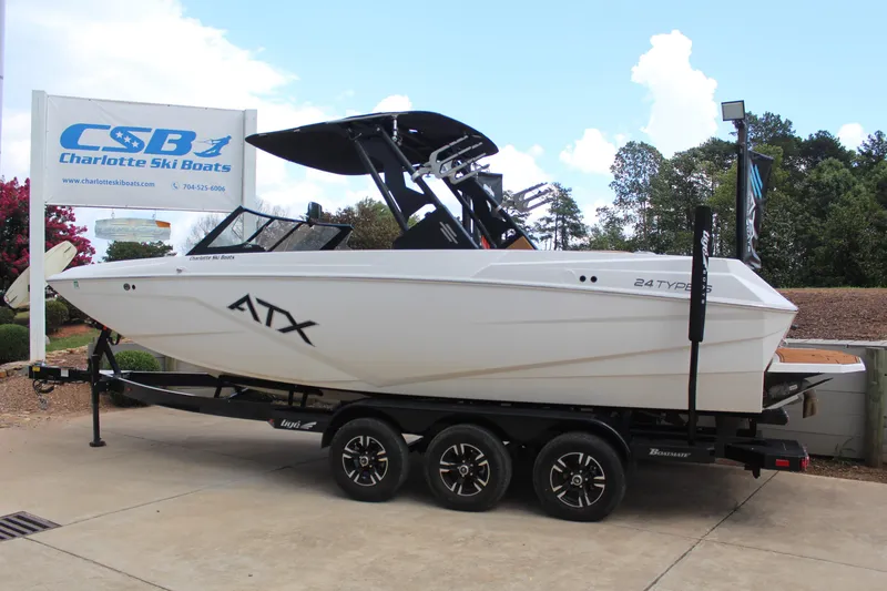 Slide: The Image of 2021 ATX Surf Boats 24 Type-S on trailer at Charlotte Ski Boats dealership. - 6
