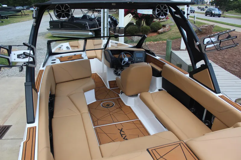 Slide: The Image of Interior view of a 2021 ATX Surf Boats 24 Type-S with beige seating and modern design. - 10