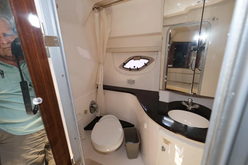Slide: The Image of 2015 Regal 35 Sport Coupe bathroom interior with modern fixtures and sleek design. - 23