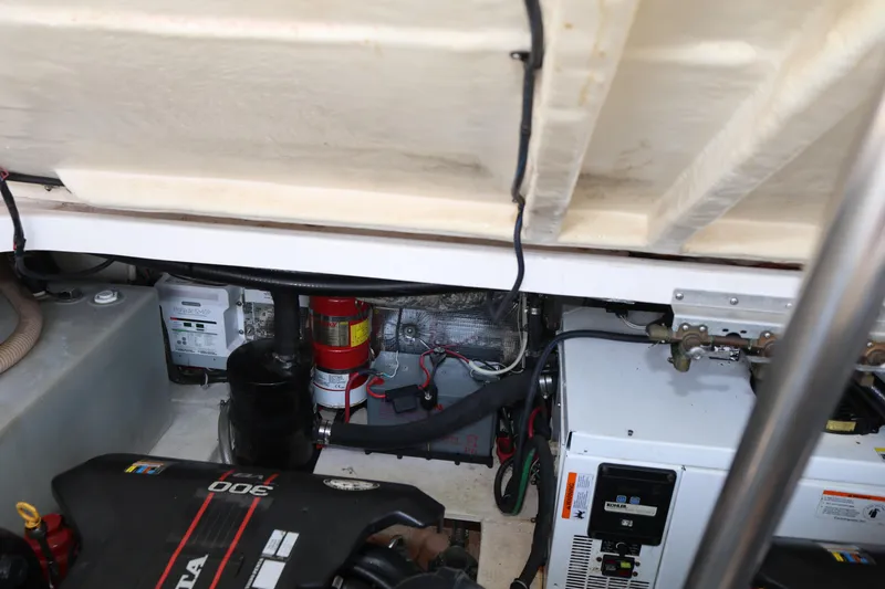 Slide: The Image of Engine compartment of a 2015 Regal 35 Sport Coupe with visible components and wiring. - 29
