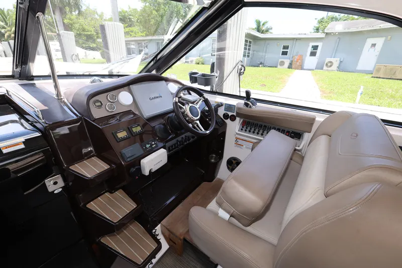 Slide: The Image of Interior cockpit of 2015 Regal 35 Sport Coupe with Garmin navigation system. - 10