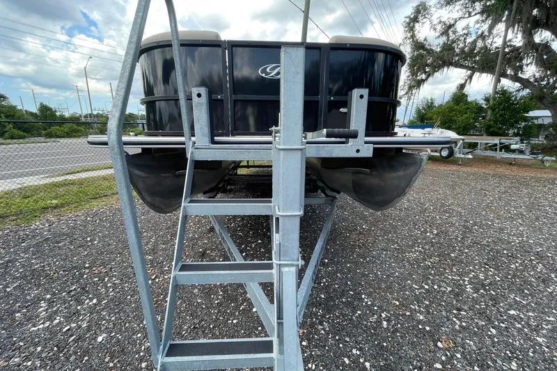 Slide: The Image of 2021 Bentley Pontoons 240 CRUISE on trailer, parked outdoors with metal ladder. - 8