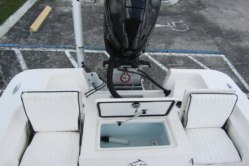 Slide: The Image of 2024 Piranha Boatworks Casador B2250 with outboard motor and seating, viewed from above. - 15