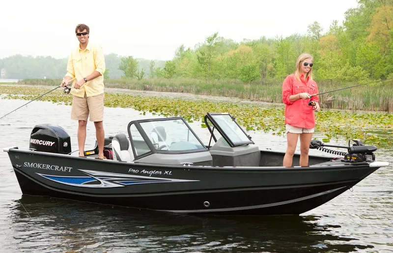 The Image of Manufacturer Provided Image: 2013 Smoker Craft Pro Angler XL 161 boat with two people fishing on a lake. - 0