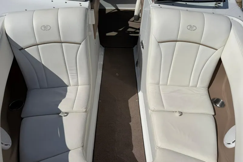 Slide: The Image of Interior seating of a 2007 Cobalt 212 boat with white upholstery. - 45