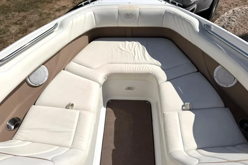 Slide: The Image of Luxurious seating area on a 2007 Cobalt 212 boat with beige and white upholstery. - 39