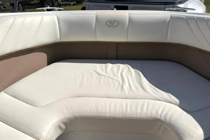 Slide: The Image of Luxurious seating on a 2007 Cobalt 212 boat, featuring cream leather upholstery. - 40