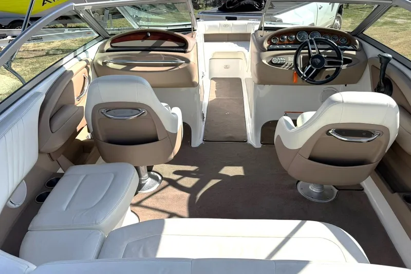 Slide: The Image of Interior of a 2007 Cobalt 212 boat with white and beige seating. - 3