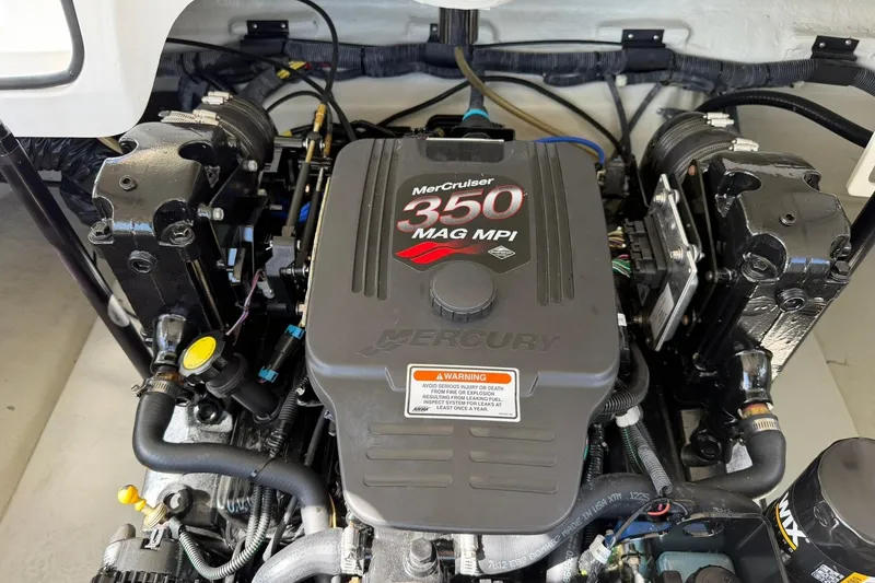 Slide: The Image of 2007 Cobalt 212 boat engine, featuring a MerCruiser 350 MAG MPI. - 38