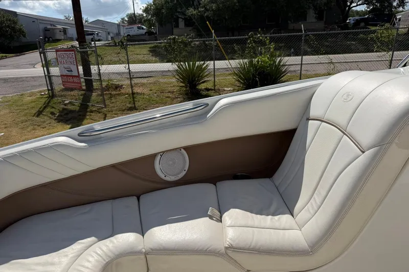 Slide: The Image of Interior of a 2007 Cobalt 212 boat with white leather seating. - 42