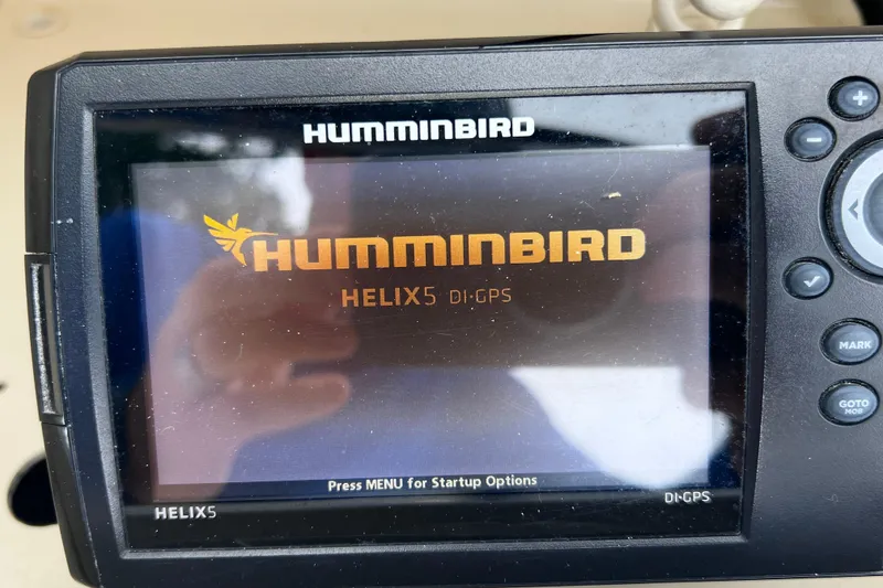 Slide: The Image of Humminbird Helix 5 DI-GPS fish finder display on 2001 Scout 202 Dorado boat. - 33