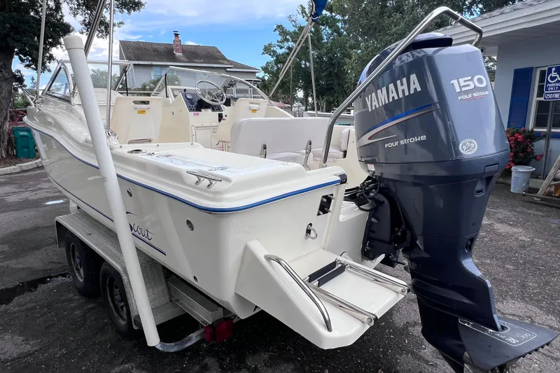 Slide: The Image of 2001 Scout 202 Dorado boat with Yamaha 150 four-stroke engine on trailer. - 8