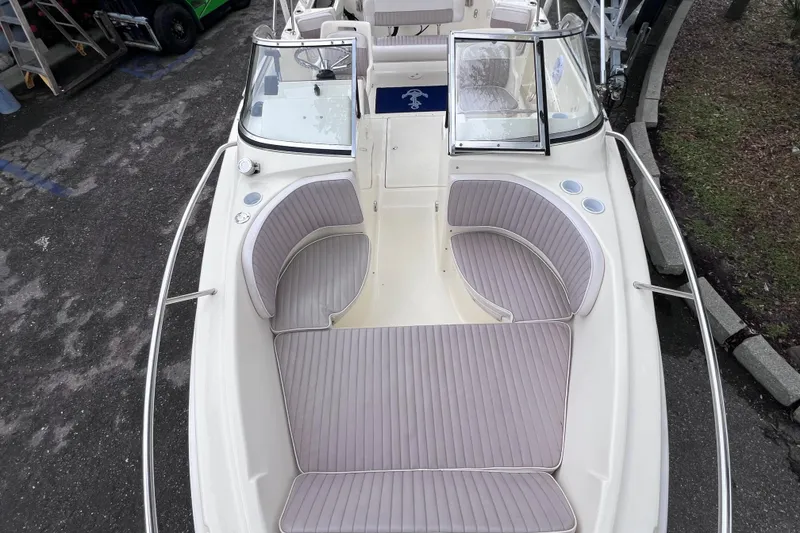 Slide: The Image of 2001 Scout 202 Dorado boat with spacious seating and open deck layout. - 35