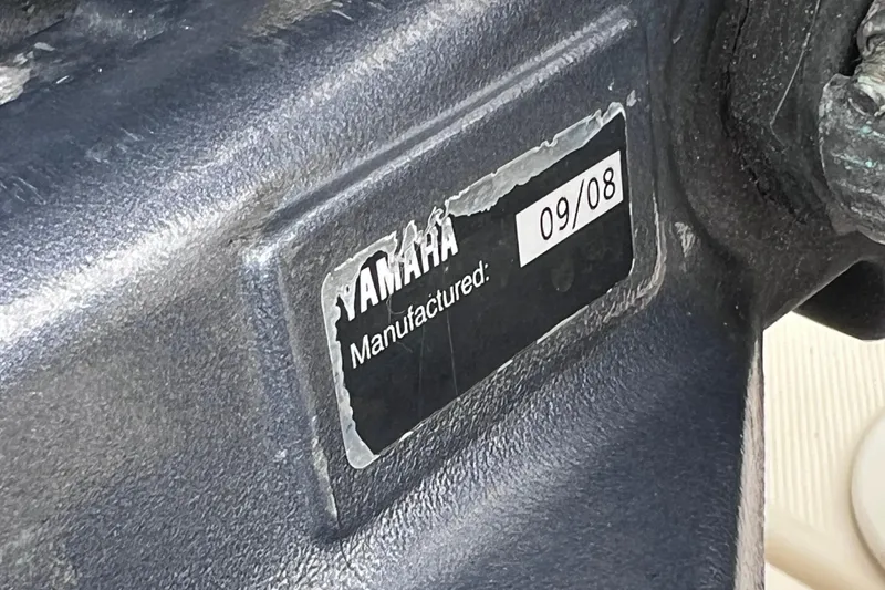 Slide: The Image of Yamaha manufacturing label on a 2001 Scout 202 Dorado boat engine. - 11