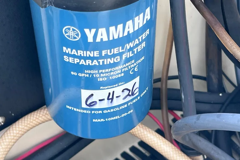 Slide: The Image of Yamaha marine fuel/water filter on 2001 Scout 202 Dorado boat, replaced 6-4-26. - 19