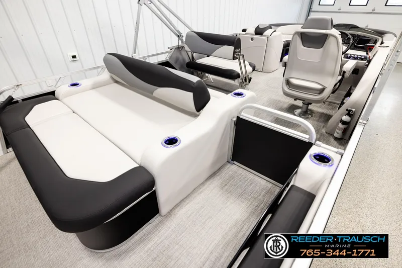 Slide: The Image of 2026 Avalon LSZ ENT pontoon boat interior with luxurious seating and modern helm. - 12