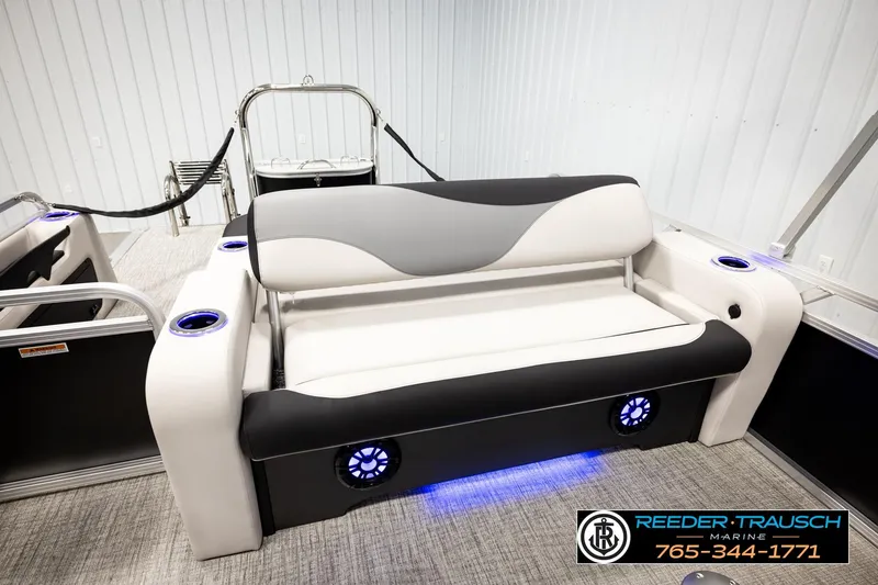 Slide: The Image of 2026 Avalon LSZ ENT boat interior with stylish seating and LED cup holders. - 25