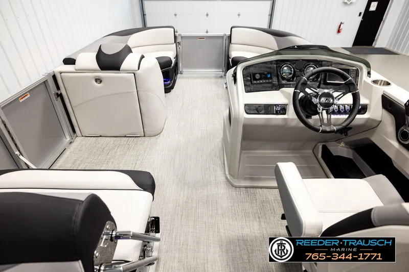 Slide: The Image of Interior of 2026 Avalon LSZ ENT pontoon boat with modern seating and steering console. - 17