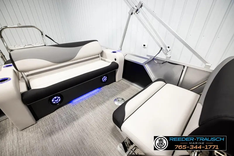 Slide: The Image of Interior of 2026 Avalon LSZ ENT boat with stylish seating and blue LED lighting. - 27