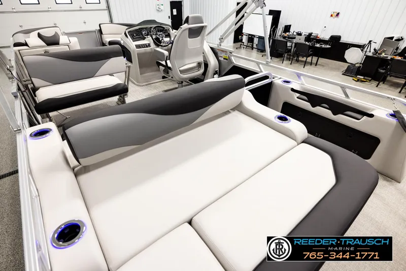 Slide: The Image of Luxurious interior of 2026 Avalon LSZ ENT pontoon boat with plush seating and modern design. - 11