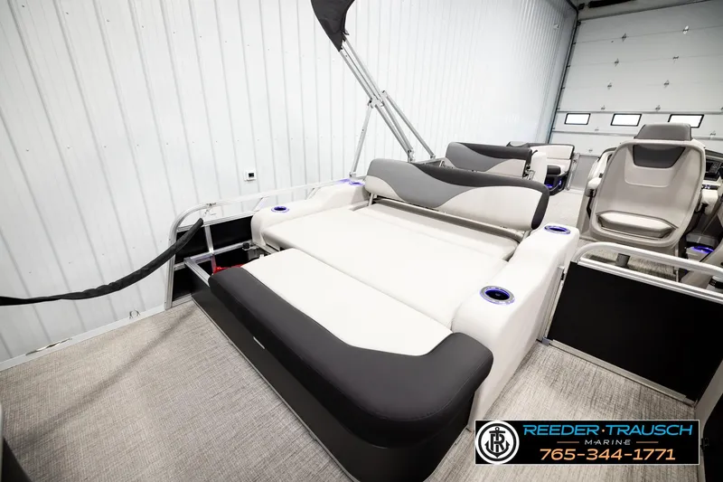 Slide: The Image of 2026 Avalon LSZ ENT pontoon boat interior with luxurious seating and modern design. - 31