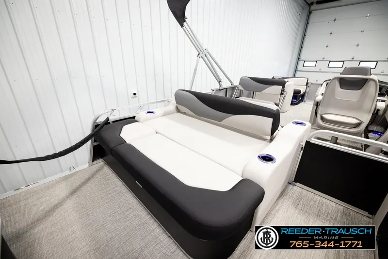 Slide: The Image of 2026 Avalon LSZ ENT pontoon boat interior with plush seating and modern design. - 29