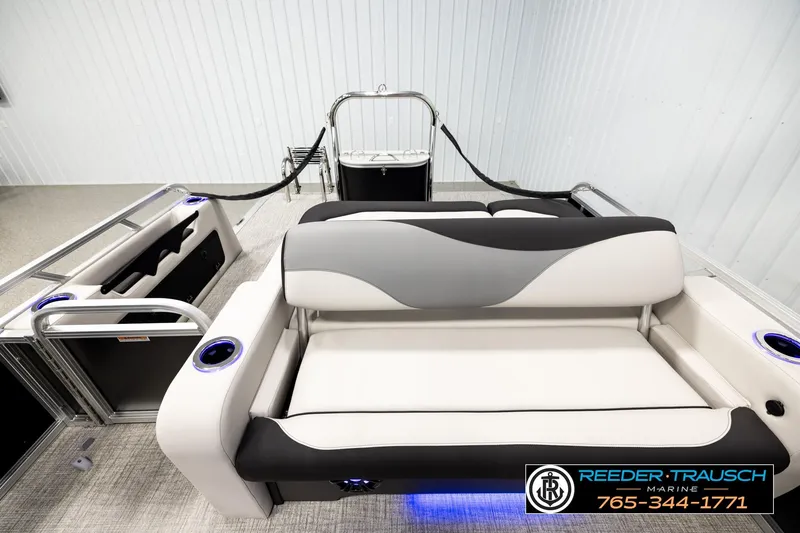 Slide: The Image of 2026 Avalon LSZ ENT pontoon boat interior with stylish seating and cup holders. - 15