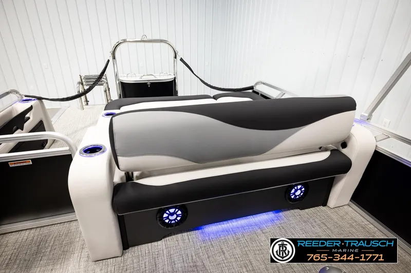 Slide: The Image of 2026 Avalon LSZ ENT boat interior with stylish seating and LED lighting. - 24