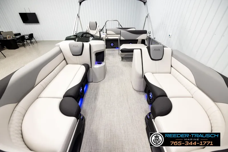 Slide: The Image of Luxurious 2026 Avalon LSZ ENT pontoon boat interior with plush seating and modern design. - 13
