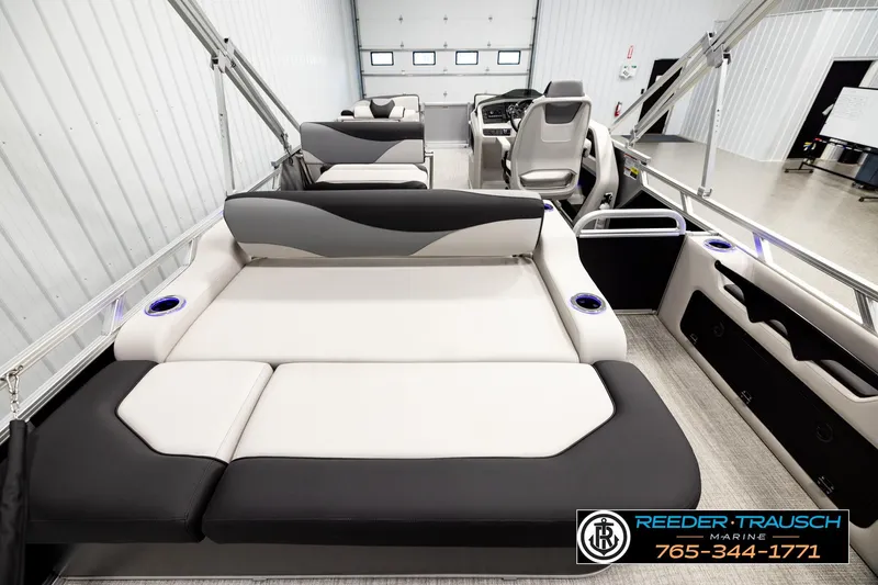 Slide: The Image of 2026 Avalon LSZ ENT pontoon boat interior with luxurious seating and modern design. - 16