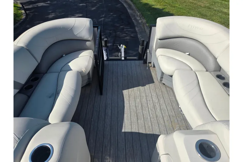 Slide: The Image of 2018 Sylvan Mirage Cruise 8522 LZ LE pontoon boat interior with plush seating. - 27