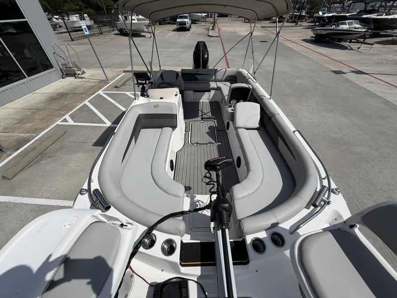 Slide: The Image of The image shows a 2018 Hurricane 201 SS boat with gray upholstery and an open deck layout. - 32