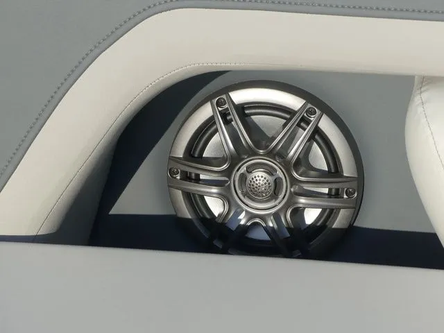 Slide: The Image of A speaker is integrated into the upholstery of a Sweetwater SW 2086 FS boat. - 35