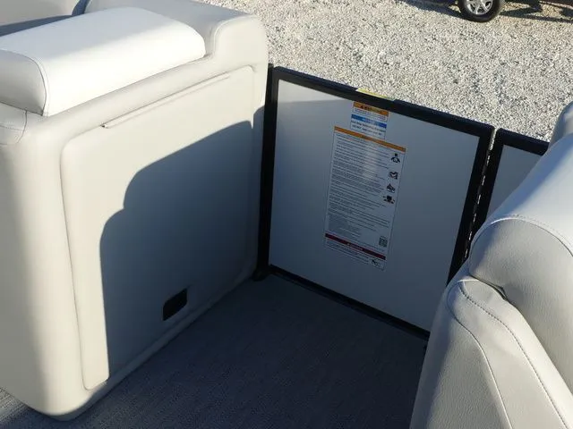 Slide: The Image of Interior of a Sweetwater SW 2086 FS with gray upholstery and safety information. - 21