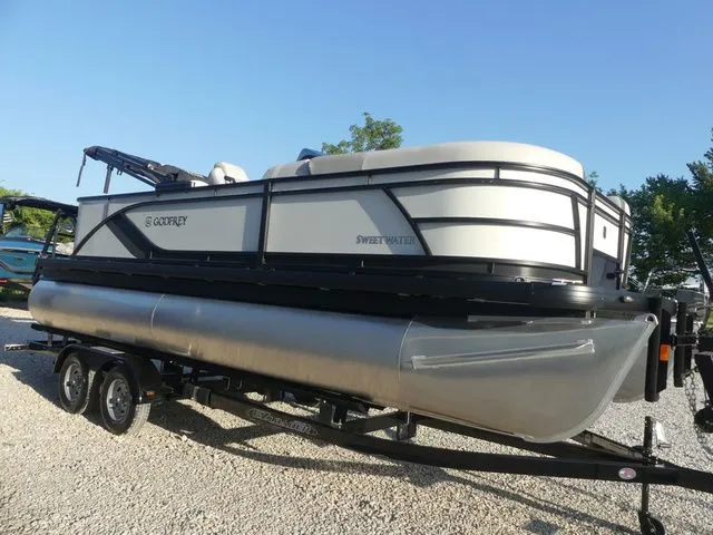 Slide: The Image of A 2026 Sweetwater SW 2086 FS pontoon boat on a trailer, ready for transport. - 4