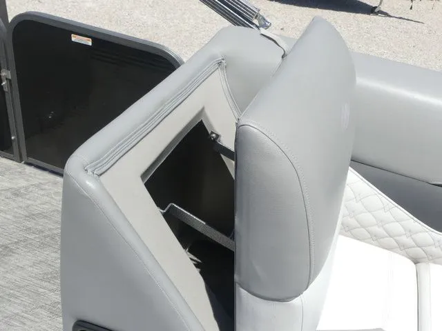 Slide: The Image of Gray upholstery on a boat seat with storage space underneath. - 30