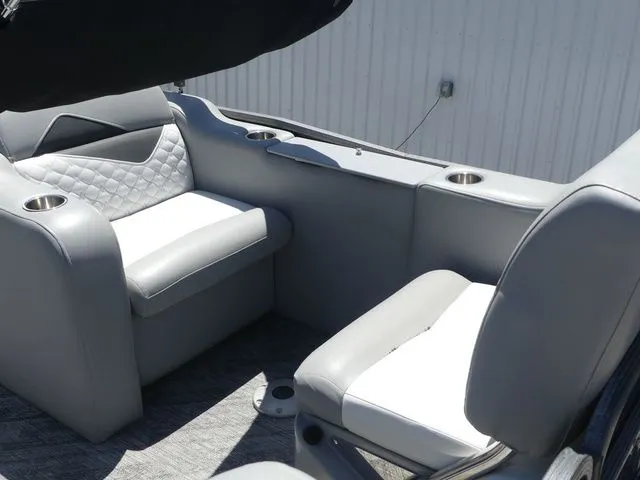 Slide: The Image of Interior of the 2019 Manitou Encore 25 SR SHP with gray and white seating. - 43