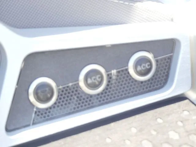 Slide: The Image of Close-up of three round switches on a boat panel. - 38