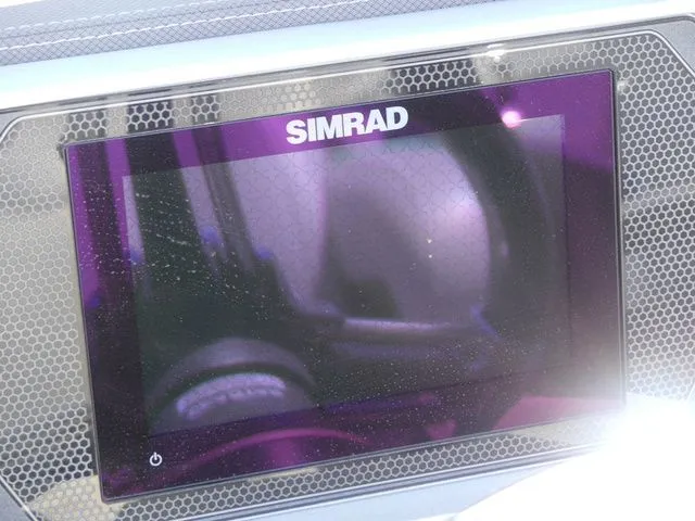 Slide: The Image of Close-up of a Simrad screen on a Manitou Encore 25 SR SHP boat. - 39