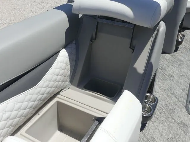 Slide: The Image of Gray and white upholstery with storage space on a boat. - 33