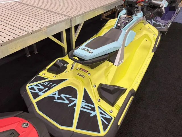 Slide: The Image of A yellow 2025 Yamaha WaveRunner JetBlaster with a blue seat and modern design. - 4