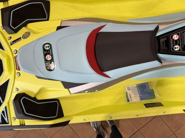 Slide: The Image of Close-up of a yellow Yamaha WaveRunner JetBlaster with a blue seat and red accents. - 6