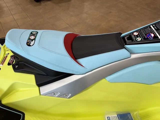 Slide: The Image of A 2025 Yamaha WaveRunner JetBlaster with a light blue and red seat on a yellow hull. - 5