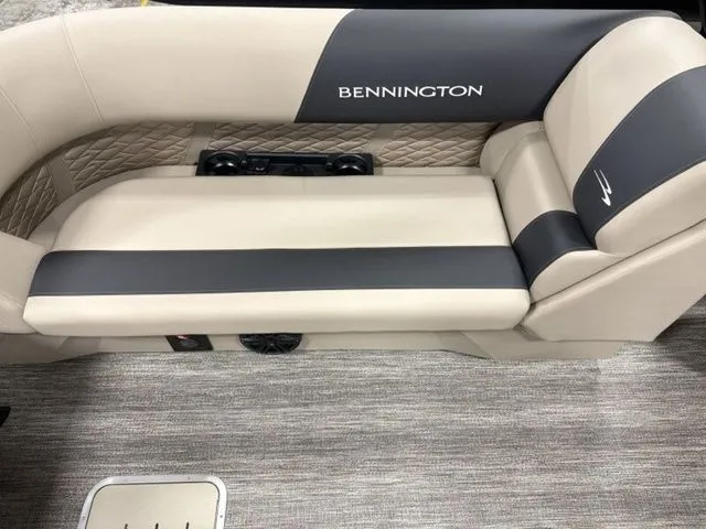 Slide: The Image of Elegant bench seat with Bennington logo, beige and dark gray, on a boat. - 16
