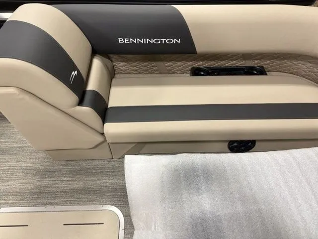 Slide: The Image of The interior of a 2026 Bennington S Quad Bench 23 SSR with sleek upholstery. - 10