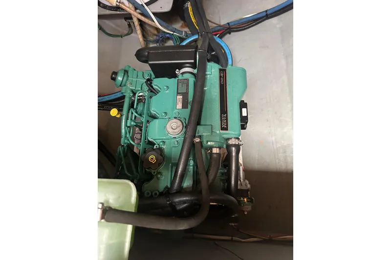 Slide: The Image of Engine compartment of a 1999 Baltec Engineering Visiona Catamaran, featuring a Volvo Penta engine. - 64